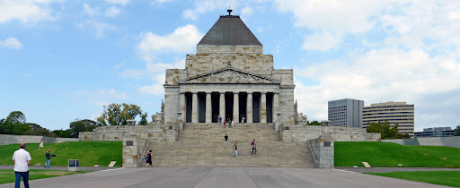 ALT: Image of the Melbourne war memorial. This building is a classic-style stone building.