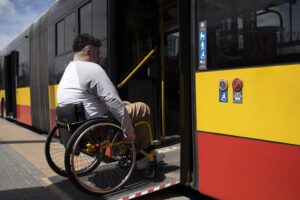 Wheelchair user entering a melbourne tram